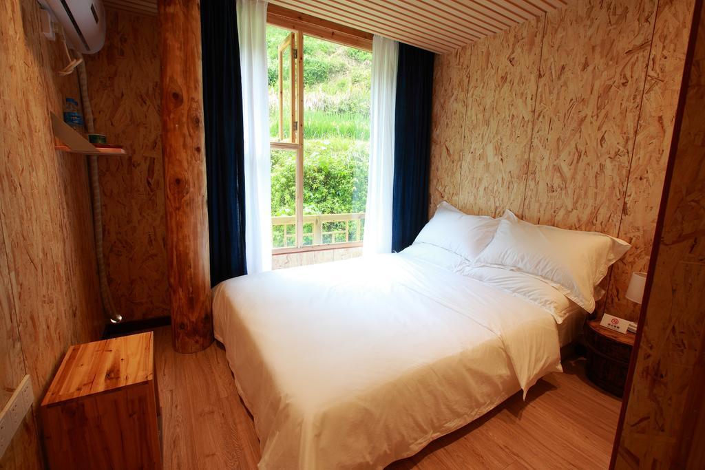 Tong Sang Art Hotel Liping Habitación foto